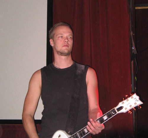 Tomi Koivusaari on guitar